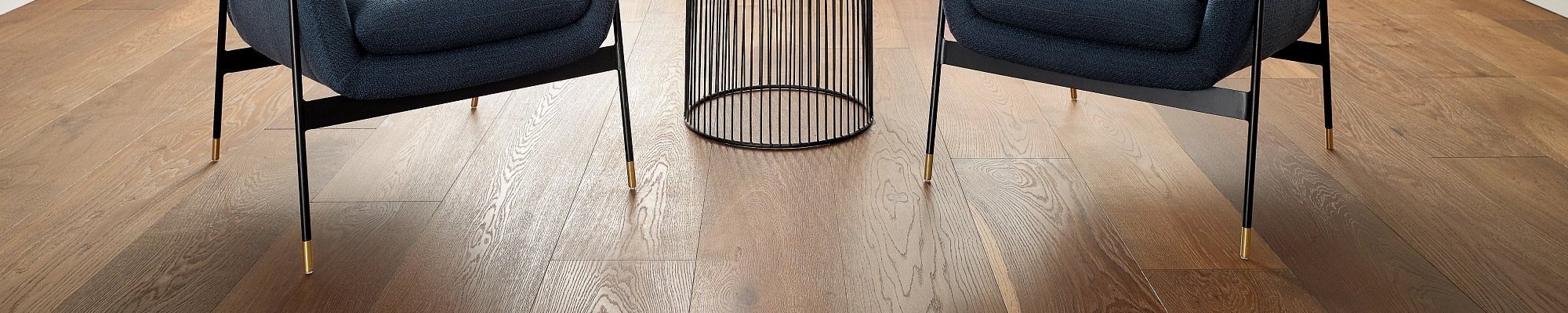 two arm chairs on wood floors - Abdinoors Carpet Craft Inc